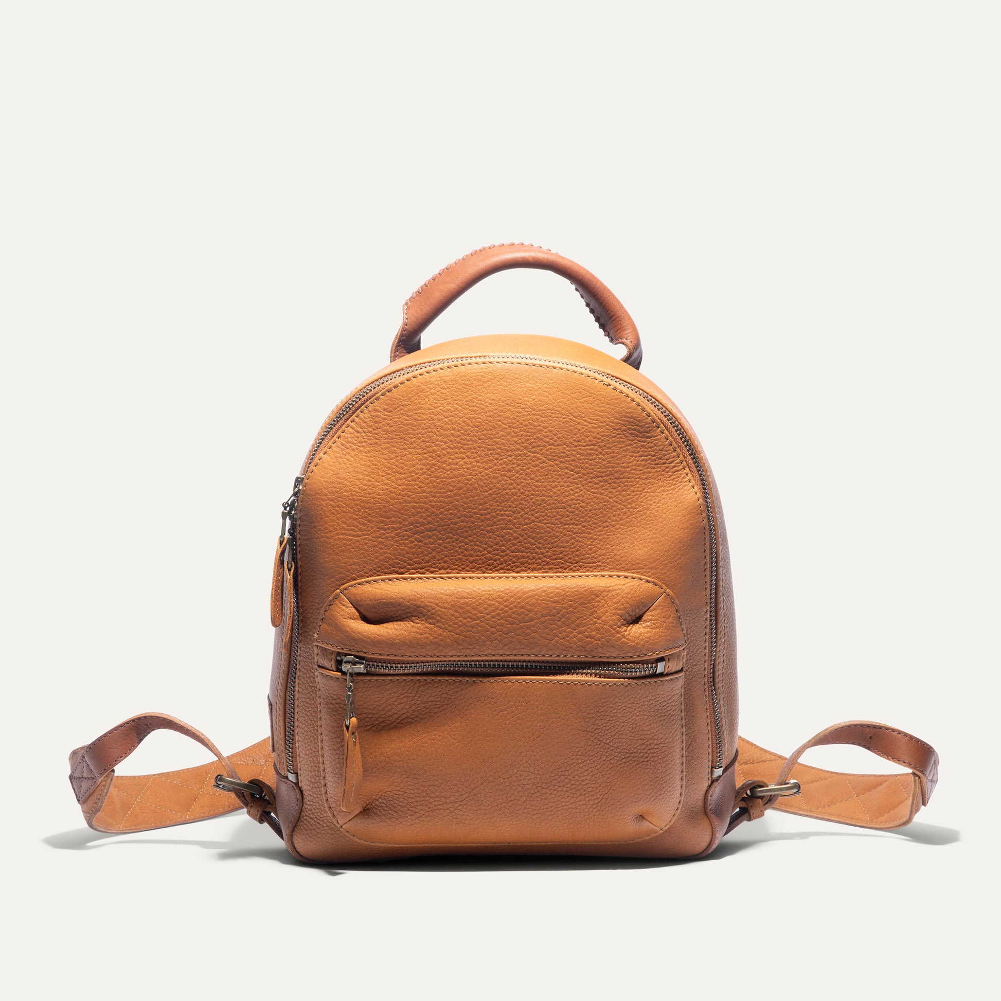 auxiliaryleather mini backpack Ella Full-Grain Leather Handcrafted in Ethiopia this backpack keeps your essentials secure while complementing your look Mini Journey Backpack TURQUOISE/TAN