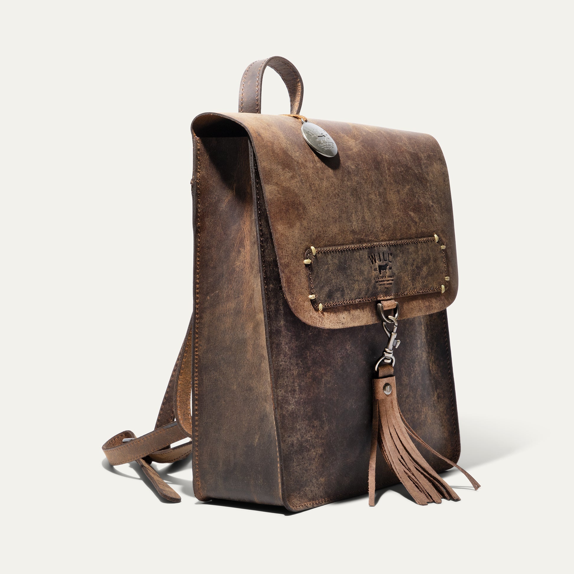 cowboy leather backpack Western with Tooled Leather & Cowhide Tanned + Tooled Soft and supple leather that ages beautifully as it wears ADBGM344 American Darling Hand Tooled
